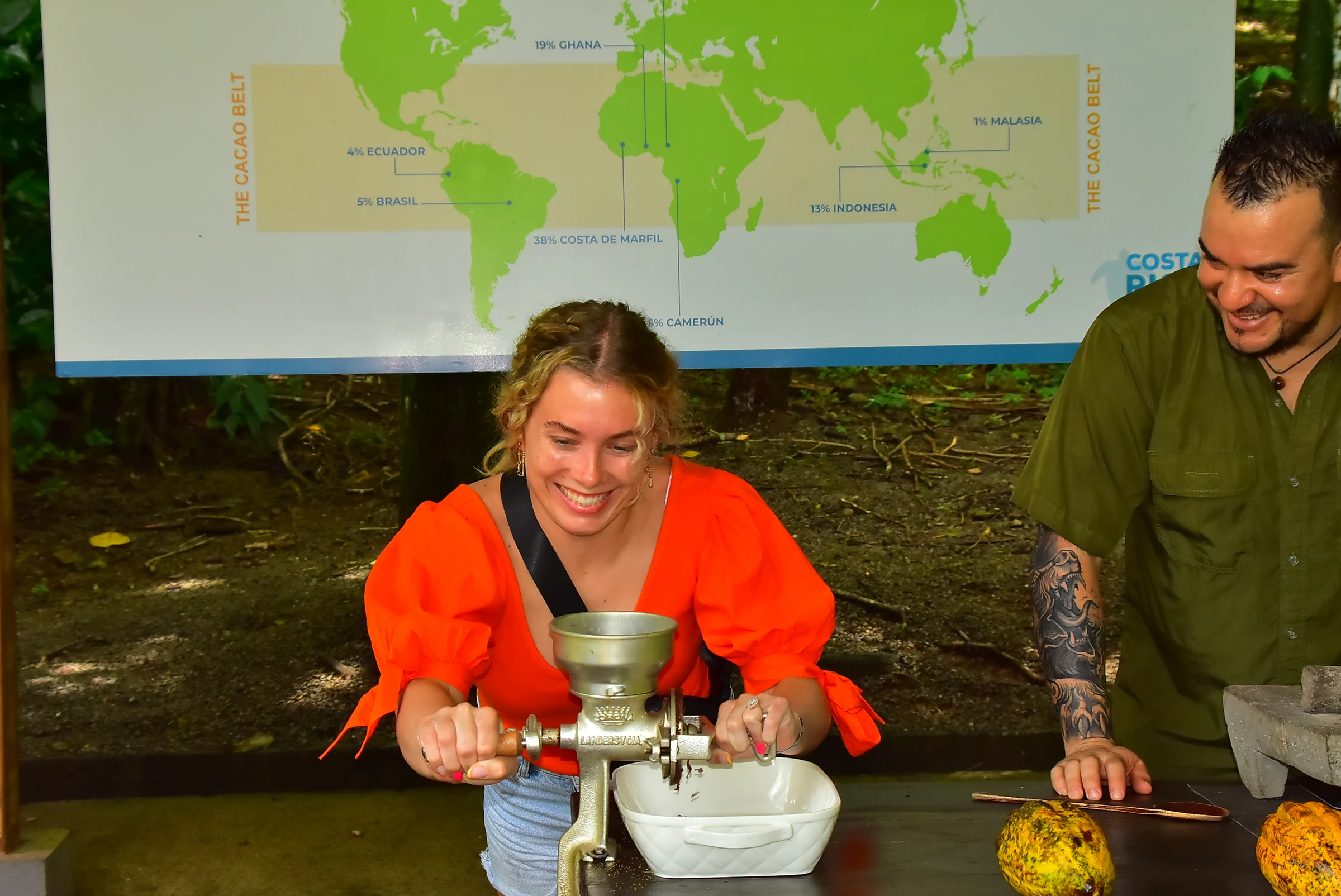 A guest grinding cacao