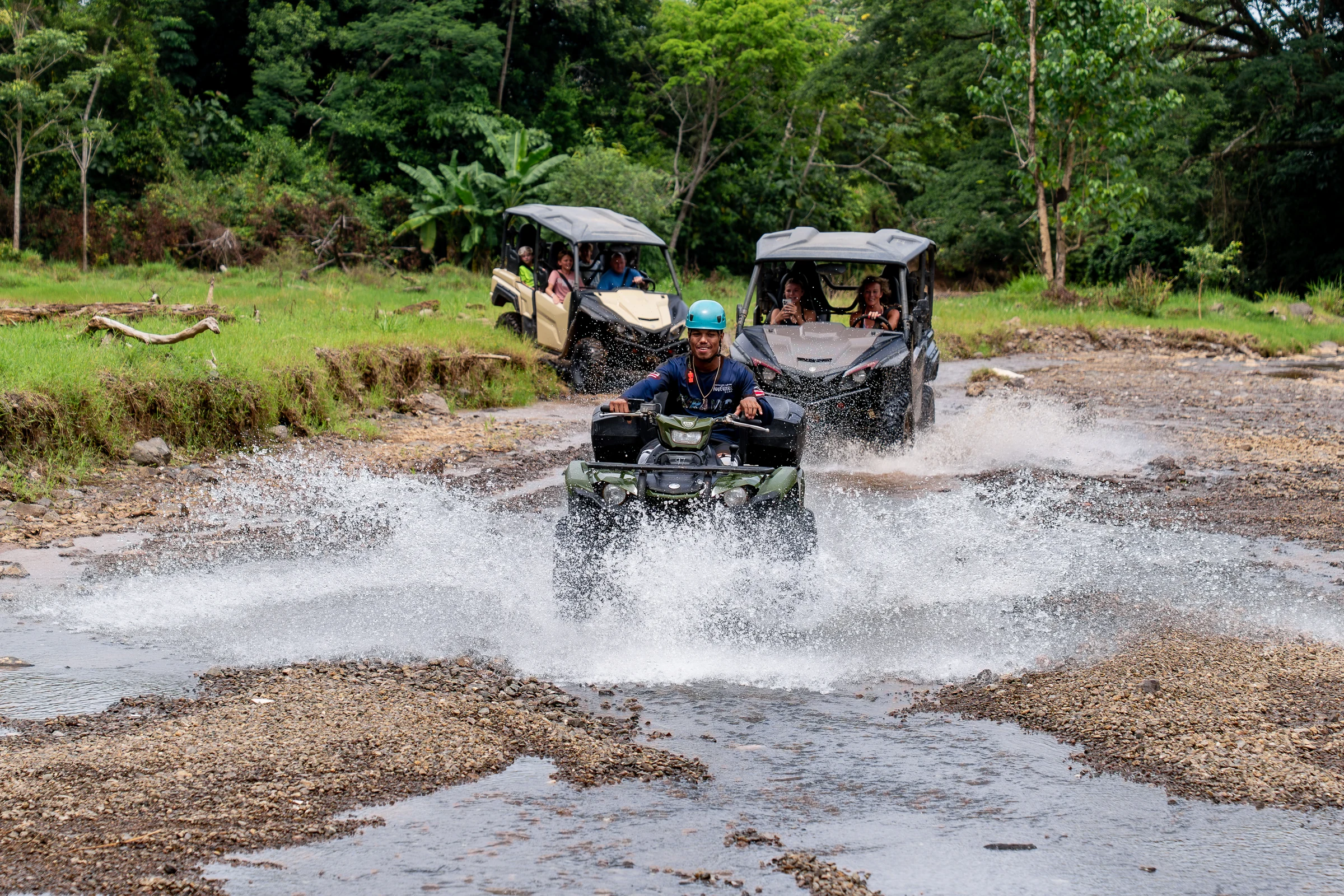 Buggies crossing a shallow river